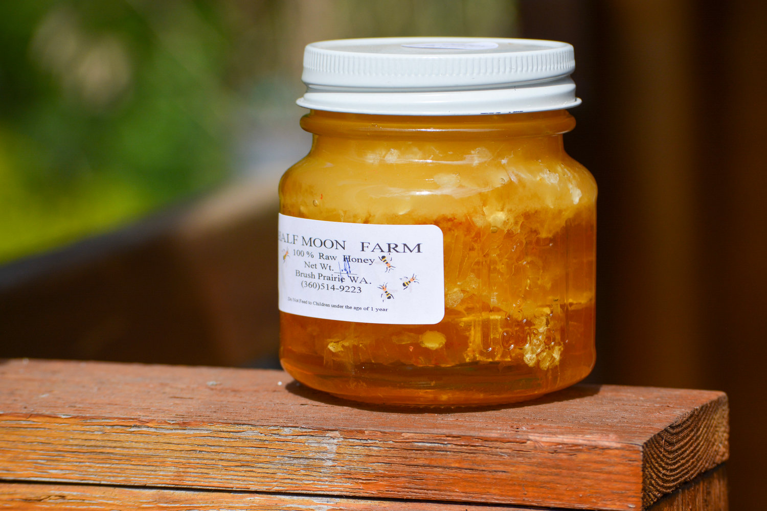 Half Moon Farm owner Brenda Calvert produces jars of honey like the one pictured. She started raising bees 16 years ago and now operates 20 hives.